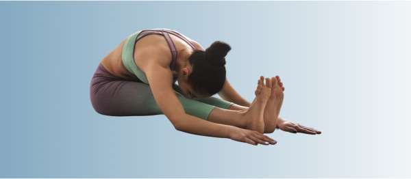 Woman practicing Seated Forward Fold yoga pose for perimenopause relief and flexibility