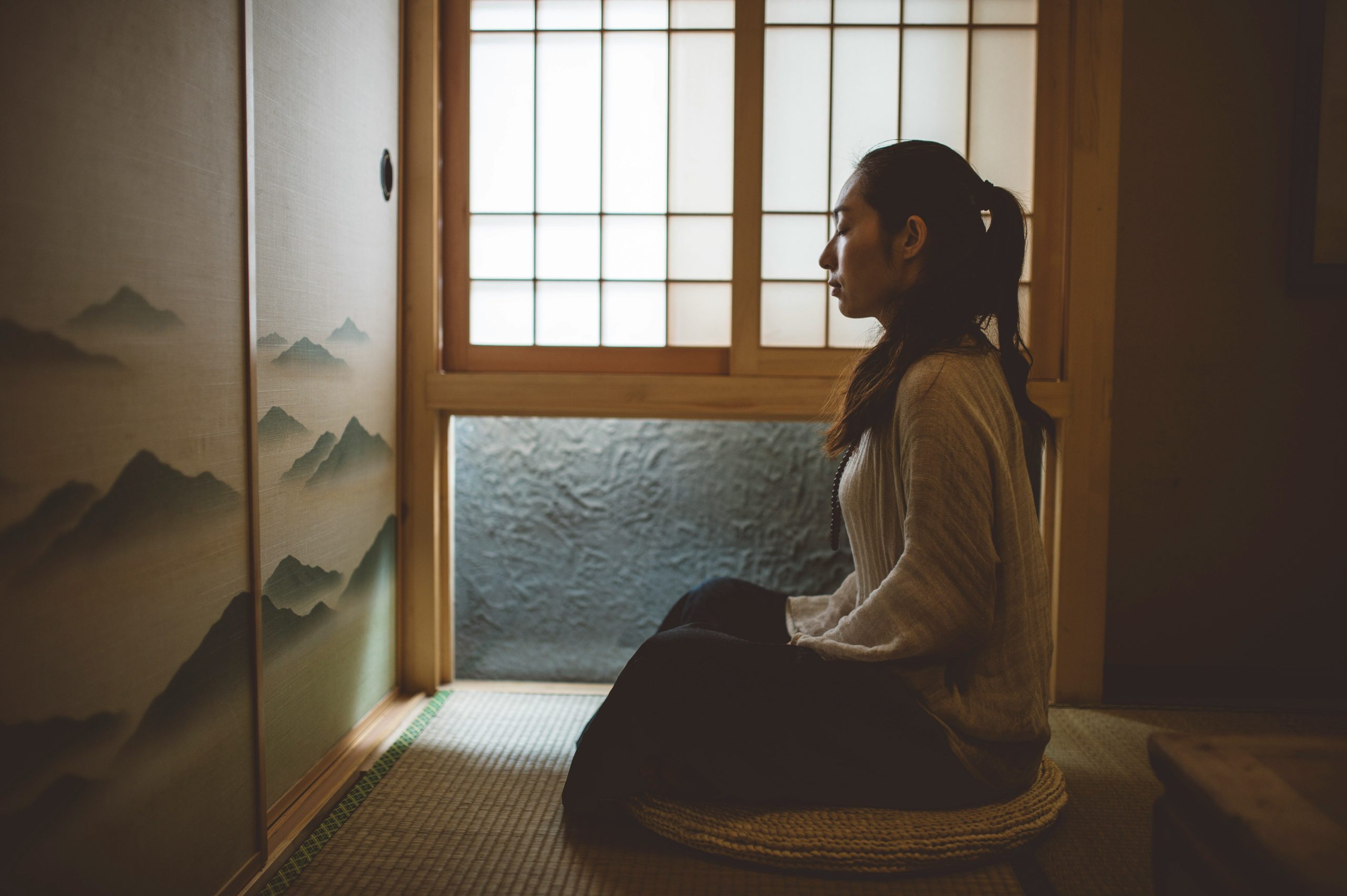 Woman meditating during perimenopause—supporting mental wellbeing and emotional balance