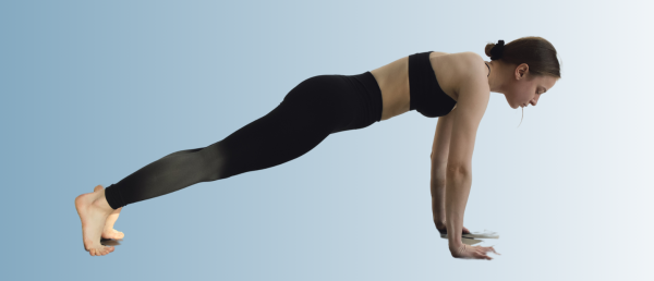Woman doing push-ups to stay strong and healthy during perimenopause