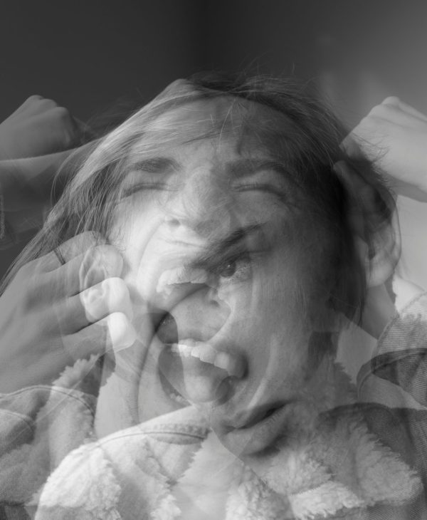 “Woman laughing and then frustrated, representing menopause mood swings”