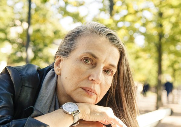 Woman looking tired and thoughtful, representing menopause symptoms