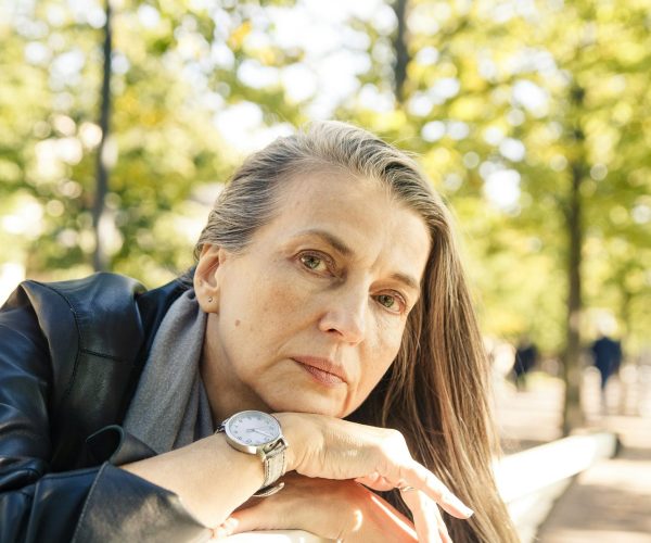 Woman looking tired and thoughtful, representing menopause symptoms